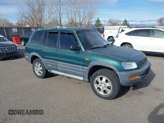 1997 Toyota RAV4 with VIN JT3HP10V2V0147285, listed as a IAAI auction lot 41856796 with 303,535 mi miles and . Bid and sale history available at DreamBid. Image 1.