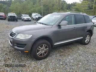 2010 Volkswagen Touareg VR6 with VIN WVGBF7A91AD001497, listed as a Copart auction lot 68234794 with 173,826 mi miles and Clean Title. Bid and sale history available at DreamBid. Image 1.