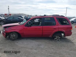 2002 Oldsmobile Bravada z VIN 1GHDT13S422393594, wystawiony jako IAAI lot #42150286 z przebiegiem 231 104 mil mil oraz . Historia ofert i sprzedaży dostępna na DreamBid. Obrazek 14.