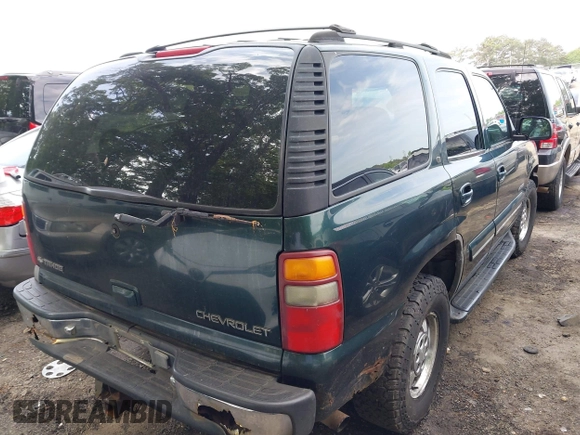 2001 Chevrolet Tahoe LT with VIN 1GNEK13T51R116634, listed as a IAAI auction lot 42106345 with 264,916 mi miles. Bid and sale history available at carsss.com. Image 4.