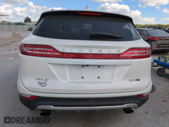 2016 Lincoln MKC Select with VIN 5LMCJ2D9XGUJ22052, listed as a Copart auction lot 71484584 with 88,799 mi miles and Salvage Title. Bid and sale history available at DreamBid. Image 6.