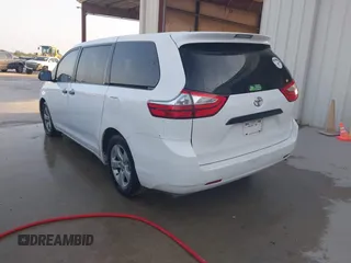 2015 Toyota Sienna L with VIN 5TDZK3DC5FS657115, listed as a IAAI auction lot 42109678 with 176,995 mi miles. Bid and sale history available at carsss.com. Image 3.