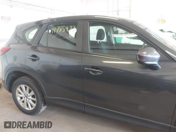 2014 Mazda CX-5 Sport with VIN JM3KE4BE5E0375360, listed as a IAAI auction lot 41788977 with 135,487 mi miles. Bid and sale history available at carsss.com. Image 13.