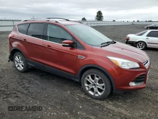 2015 Ford Escape Titanium z VIN 1FMCU9J92FUC37234, wystawiony jako Copart lot #57681855 z przebiegiem 96 973 mil mil oraz Szkoda całkowita • Salvage title. Historia ofert i sprzedaży dostępna na DreamBid. Obrazek 4.