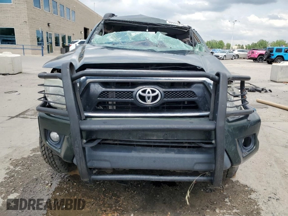 2012 Toyota Tacoma z VIN 3TMLU4ENXCM082978, wystawiony jako Copart lot #60069475 z przebiegiem 169 533 mil mil oraz Szkoda całkowita • Salvage title. Historia ofert i sprzedaży dostępna na DreamBid. Obrazek 5.