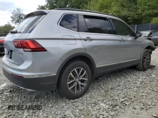 2020 Volkswagen Tiguan SE with VIN 3VV2B7AX4LM022562, listed as a Copart auction lot 69816034 with 61,789 mi miles and Salvage Title. Bid and sale history available at DreamBid. Image 3.