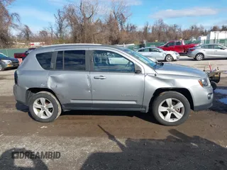 2016 Jeep Compass Latitude with VIN 1C4NJDEB5GD713905, listed as a IAAI auction lot 41138023 with 107,479 mi miles and . Bid and sale history available at DreamBid. Image 14.