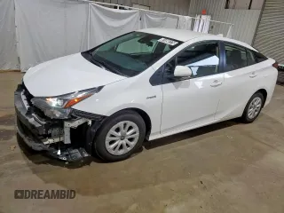 2022 Toyota Prius L Eco z VIN JTDKAMFU3N3182144, wystawiony jako Copart lot #61090375 z przebiegiem 81 673 mil mil oraz Czysty tytuł • Clean title. Historia ofert i sprzedaży dostępna na DreamBid. Obrazek 1.
