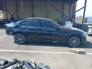 2018 BMW 5 Series 530e xDrive with VIN WBAJB1C51JB374308, listed as a IAAI auction lot 41965038 with 122,791 mi miles and . Bid and sale history available at carsss.com. Image 14.