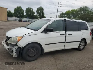 2009 Honda Odyssey LX z VIN 5FNRL38259B050624, wystawiony jako Copart lot #57357605 z przebiegiem 232 991 mil mil oraz Czysty tytuł • Clean title. Historia ofert i sprzedaży dostępna na DreamBid. Obrazek 1.