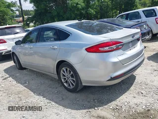 2017 Ford Fusion SE z VIN 3FA6P0HDXHR238713, wystawiony jako IAAI lot #42304140 z przebiegiem 157 630 mil mil oraz . Historia ofert i sprzedaży dostępna na DreamBid. Obrazek 3.