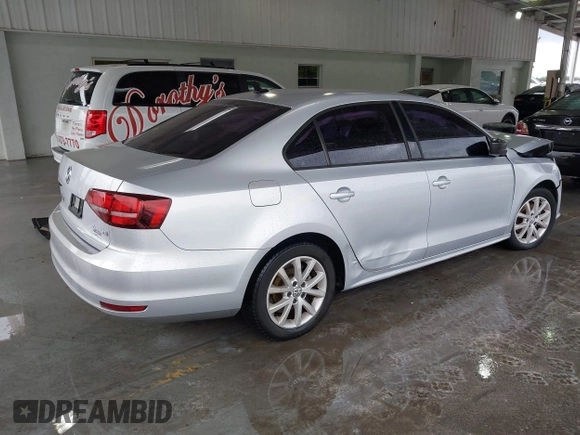2016 Volkswagen Jetta Sedan 1.4T SE with VIN 3VWD67AJ2GM252658, listed as a IAAI auction lot 41757319 with 147,483 mi miles. Bid and sale history available at carsss.com. Image 4.