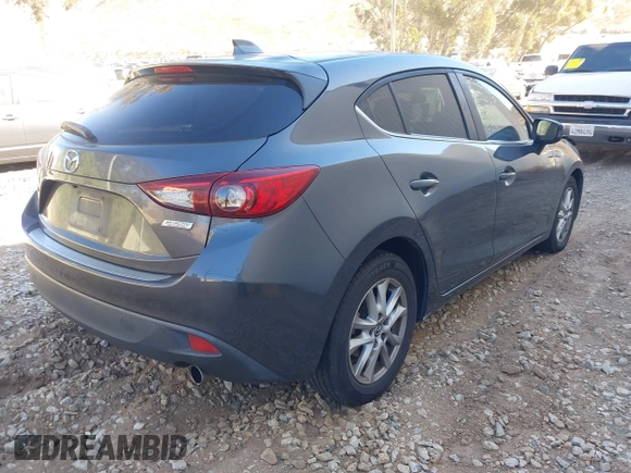 2014 Mazda 3 i Grand Touring with VIN JM1BM1M77E1119529, listed as a IAAI auction lot 41399739 with 126,931 mi miles and . Bid and sale history available at DreamBid. Image 4.