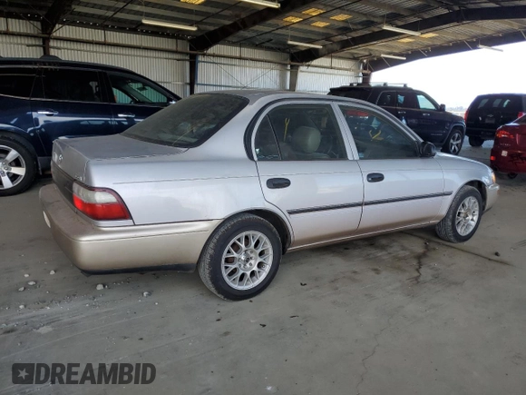 1997 Toyota Corolla with VIN 1NXBA02E4VZ577026, listed as a Copart auction lot 66184515 with 201,324 mi miles and Clean title. Bid and sale history available at DreamBid. Image 3.