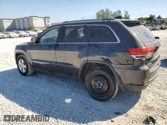2014 Jeep Grand Cherokee Altitude with VIN 1C4RJFAG8EC242995, listed as a Copart auction lot 48572595 with 138,468 mi miles and Salvage Title. Bid and sale history available at carsss.com. Image 2.