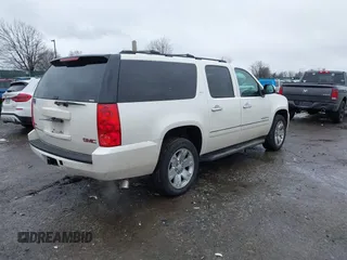2012 GMC Yukon XL SLT with VIN 1GKS2KE77CR205341, listed as a IAAI auction lot 41565367 with 165,500 mi miles. Bid and sale history available at carsss.com. Image 4.
