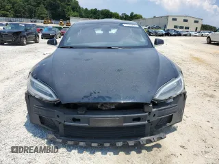 2017 Tesla Model S 100D z VIN 5YJSA1E21HF209847, wystawiony jako Copart lot #61848255 z przebiegiem 140 807 mil mil oraz Szkoda całkowita • Salvage title. Historia ofert i sprzedaży dostępna na DreamBid. Obrazek 5.