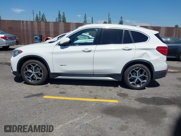 2017 BMW X1 xDrive28i with VIN WBXHT3C33H5F86831, listed as a IAAI auction lot 42019082 with 74,708 mi miles and . Bid and sale history available at DreamBid. Image 14.