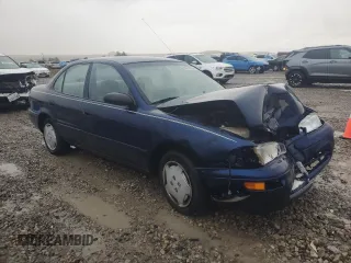 1997 Geo Prizm z VIN 1Y1SK5269VZ449631, wystawiony jako Copart lot #76770154 z przebiegiem 147 812 mil mil oraz Szkody całkowita. Historia ofert i sprzedaży dostępna na DreamBid. Obrazek 4.
