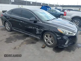 2018 Hyundai Sonata SEL z VIN 5NPE34AF4JH633001, wystawiony jako IAAI lot #42061141 z przebiegiem 77 727 mil mil oraz . Historia ofert i sprzedaży dostępna na DreamBid. Obrazek 1.