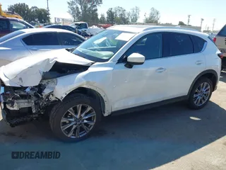 2020 Mazda CX-5 Grand Touring with VIN JM3KFADM0L1838495, listed as a IAAI auction lot 41991566 with 32,021 mi miles. Bid and sale history available at carsss.com. Image 14.