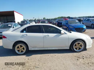 2007 Acura TSX z VIN JH4CL96817C011893, wystawiony jako IAAI lot #42231111 z przebiegiem 162 577 mil mil oraz . Historia ofert i sprzedaży dostępna na DreamBid. Obrazek 14.