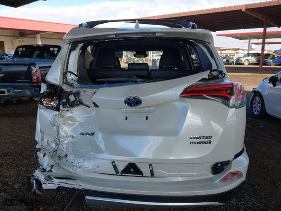 2016 Toyota RAV4 Hybrid Limited with VIN JTMDJREV6GD016181, listed as a IAAI auction lot 41616922 with 95,037 mi miles. Bid and sale history available at carsss.com. Image 16.