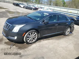 2014 Cadillac XTS Luxury z VIN 2G61N5S3XE9326303, wystawiony jako Copart lot #54863215 z przebiegiem 129 588 mil mil oraz Szkoda całkowita • Salvage title. Historia ofert i sprzedaży dostępna na DreamBid. Obrazek 1.