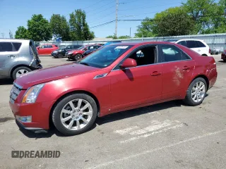 2009 Cadillac CTS AWD z VIN 1G6DG577790165752, wystawiony jako Copart lot #56229725 z przebiegiem 152 488 mil mil oraz Czysty tytuł • Clean title. Historia ofert i sprzedaży dostępna na DreamBid. Obrazek 1.