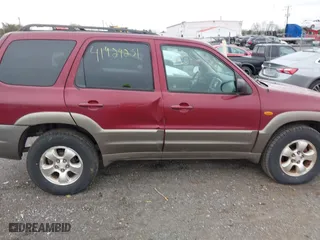 2003 Mazda Tribute ES with VIN 4F2CZ96113KM50496, listed as a IAAI auction lot 41929251 with 187,755 mi miles. Bid and sale history available at carsss.com. Image 6.