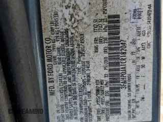 2012 Ford Fusion SEL z VIN 3FAHP0JA1CR182047, wystawiony jako Copart lot #56521525 z przebiegiem 200 523 mil mil oraz Szkoda całkowita • Salvage title. Historia ofert i sprzedaży dostępna na DreamBid. Obrazek 13.
