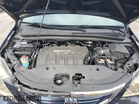 2010 Honda Odyssey EX with VIN 5FNRL3H46AB105054, listed as a Copart auction lot 56710665 with 118,156 mi miles and Salvage title. Bid and sale history available at DreamBid. Image 12.