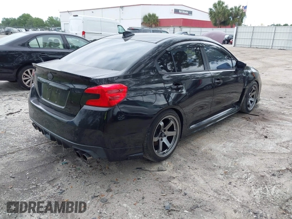 2016 Subaru WRX with VIN JF1VA1B65G9801044, listed as a IAAI auction lot 41973939 with 82,420 mi miles. Bid and sale history available at carsss.com. Image 4.