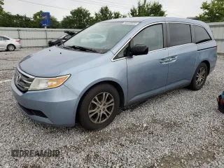 2013 Honda Odyssey EX z VIN 5FNRL5H42DB051526, wystawiony jako Copart lot #60338655 z przebiegiem 180 851 mil mil oraz Czysty tytuł • Clean title. Historia ofert i sprzedaży dostępna na DreamBid. Obrazek 1.