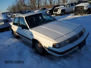 1991 Oldsmobile Cutlass z VIN 1G3AJ54N9M6353764, wystawiony jako Copart lot #87502015 z przebiegiem 170 646 mil mil oraz Szkody całkowita. Historia ofert i sprzedaży dostępna na DreamBid. Obrazek 4.