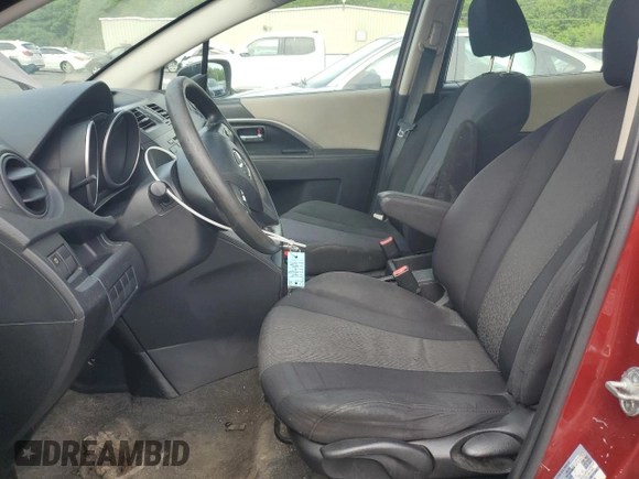 2012 Mazda 5 Sport with VIN JM1CW2BL4C0110696, listed as a Copart auction lot 58699865 with 201,603 mi miles and Salvage title. Bid and sale history available at DreamBid. Image 7.