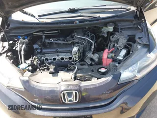 2015 Honda Fit LX z VIN 3HGGK5H51FM724566, wystawiony jako IAAI lot #42151755 z przebiegiem 168 744 mil mil oraz . Historia ofert i sprzedaży dostępna na DreamBid. Obrazek 10.