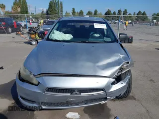 2009 Mitsubishi Lancer DE with VIN JA3AU16UX9U009351, listed as a IAAI auction lot 42139312 with 120,912 mi miles and . Bid and sale history available at carsss.com. Image 13.