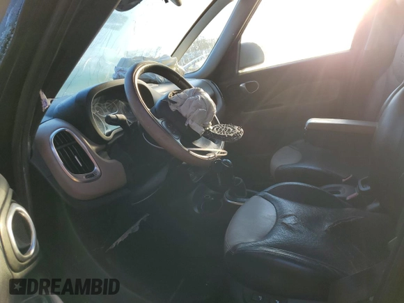 2014 FIAT 500L Lounge with VIN ZFBCFACH9EZ006050, listed as a Copart auction lot 83713724 with 144,849 mi miles and Salvage Title. Bid and sale history available at carsss.com. Image 7.