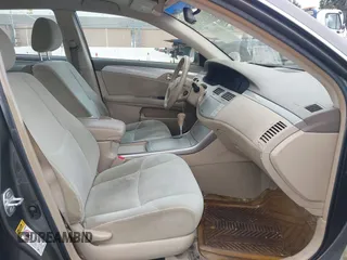 2007 Toyota Avalon XL with VIN 4T1BK36B47U175248, listed as a IAAI auction lot 42126427 with 144,284 mi miles. Bid and sale history available at carsss.com. Image 5.