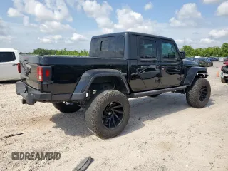2021 Jeep Gladiator Freedom with VIN 1C6HJTAG8ML580882, listed as a Copart auction lot 57690885 with Not provided miles and Salvage title. Bid and sale history available at DreamBid. Image 3.
