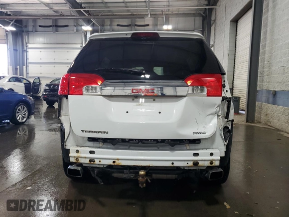 2016 GMC Terrain SLE with VIN 2GKFLTE31G6184036, listed as a Copart auction lot 52417195 with 124,704 mi miles and Salvage Title. Bid and sale history available at DreamBid. Image 6.