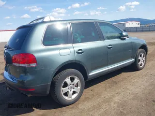 2004 Volkswagen Touareg with VIN WVGEM77L54D061132, listed as a IAAI auction lot 42127905 with 146,801 mi miles and . Bid and sale history available at DreamBid. Image 4.