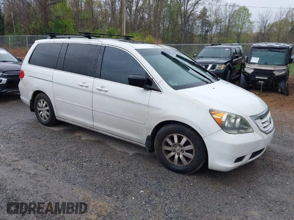 2010 Honda Odyssey EX-L with VIN 5FNRL3H65AB068497, listed as a IAAI auction lot 42013925 with 206,668 mi miles. Bid and sale history available at carsss.com. Image 1.