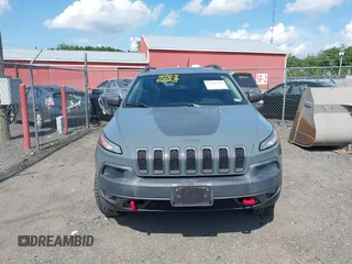2014 Jeep Cherokee Trailhawk z VIN 1C4PJMBS4EW236950, wystawiony jako IAAI lot #42636128 z przebiegiem 170 491 mil mil oraz . Historia ofert i sprzedaży dostępna na DreamBid. Obrazek 13.