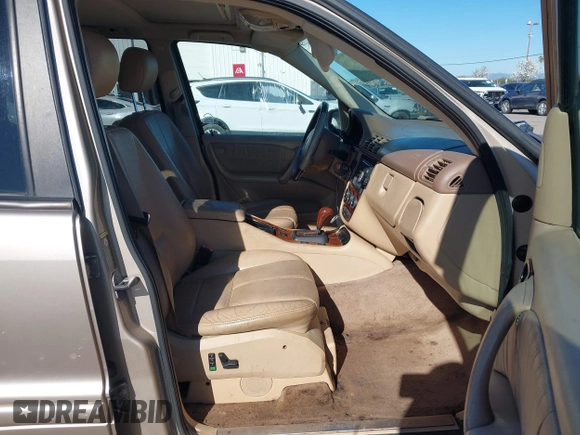 2002 Mercedes-Benz M 320/430/500 with VIN 4JGAB75E42A322824, listed as a IAAI auction lot 41871249 with 203,845 mi miles and . Bid and sale history available at carsss.com. Image 5.