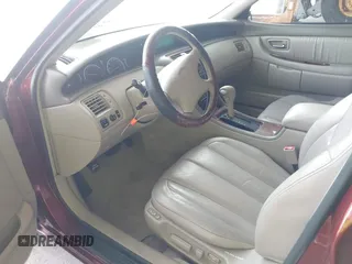 2000 Toyota Avalon XL z VIN 4T1BF28B7YU005222, wystawiony jako IAAI lot #42310903 z przebiegiem 118 700 mil mil oraz . Historia ofert i sprzedaży dostępna na DreamBid. Obrazek 5.
