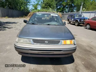 1993 Subaru Legacy L with VIN 4S3BJ6339P6948161, listed as a Copart auction lot 63123584 with 329,619 mi miles and Salvage Title. Bid and sale history available at DreamBid. Image 5.