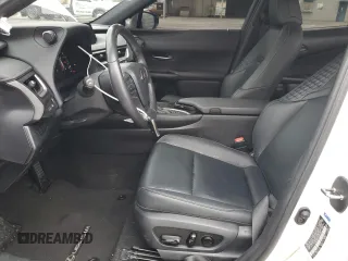 2021 Lexus UX 200 with VIN JTHX3JBHXM2040304, listed as a Copart auction lot 49006725 with 51,543 mi miles and Salvage title. Bid and sale history available at DreamBid. Image 7.