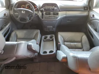2007 Honda Odyssey EX-L z VIN 5FNRL38647B077250, wystawiony jako Copart lot #56925425 z przebiegiem 159 281 mil mil oraz Szkoda całkowita • Salvage title. Historia ofert i sprzedaży dostępna na DreamBid. Obrazek 8.
